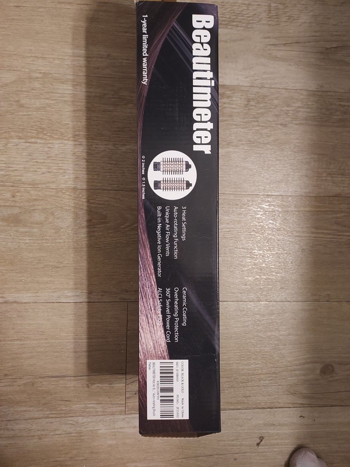 beatuitimeter hair dryer. Can roll in 2 directions and has 2 different sizes.