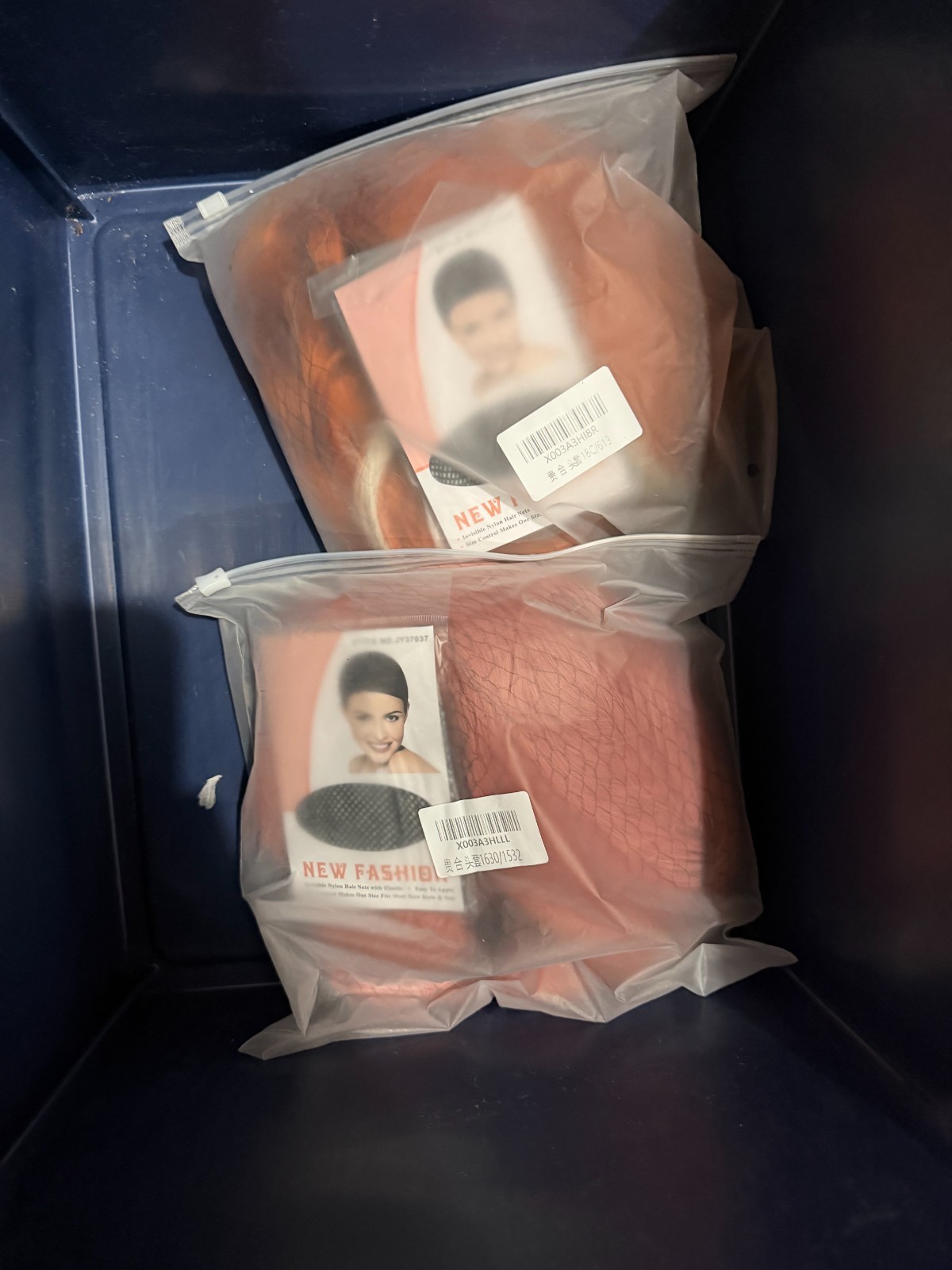2 Wigs made in china orange and pinkish not much information on them Womens wigs