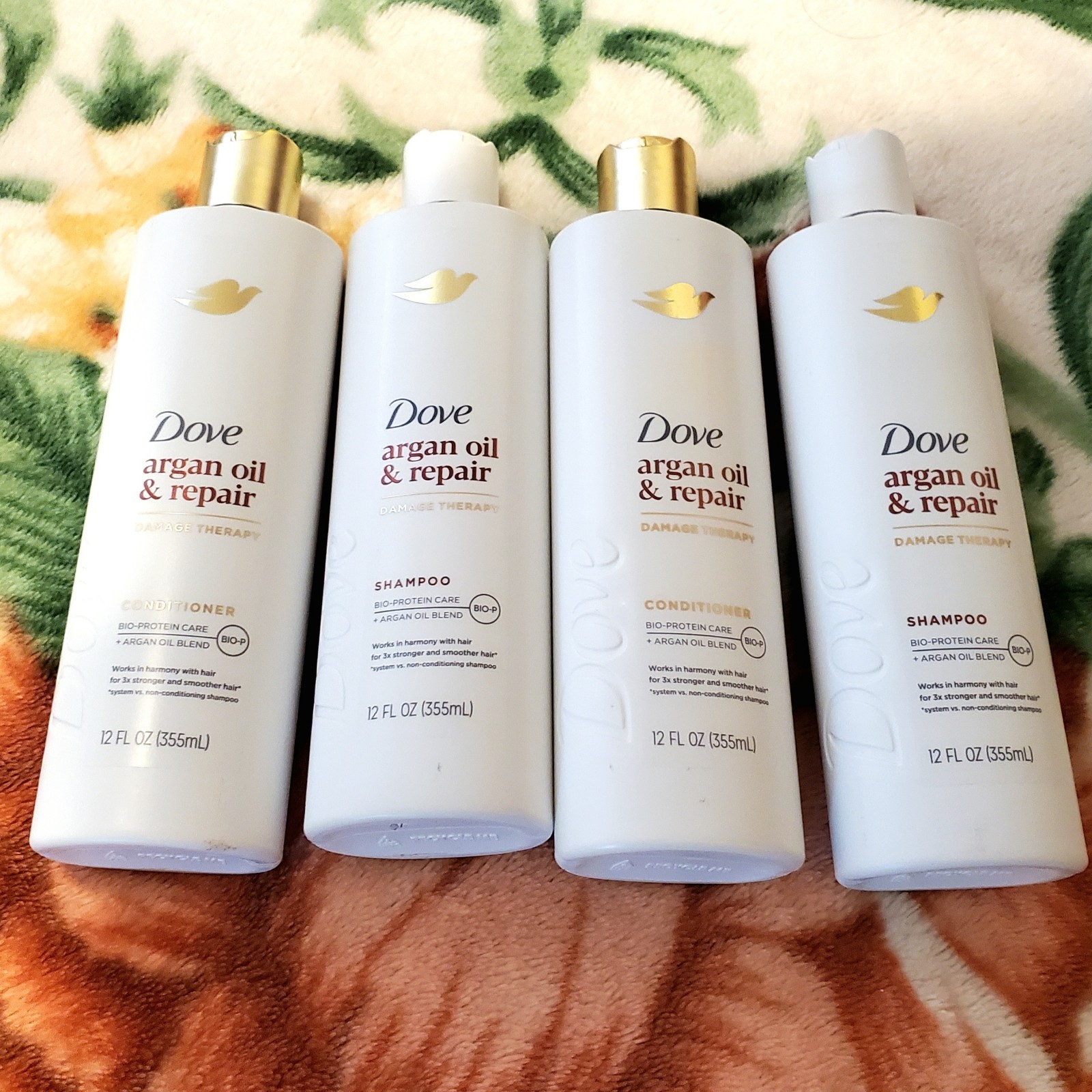 2 Dove Argan Oil + Repair 12 fl. oz. Shampoo & 2 Conditioners